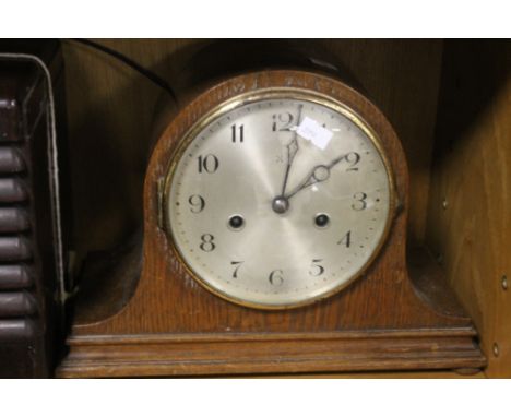 A NAPOLEON HAT MANTEL CLOCK
