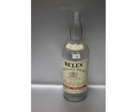 A VINTAGE BELLS OLD SCOTCH WHISKY BOTTLE
