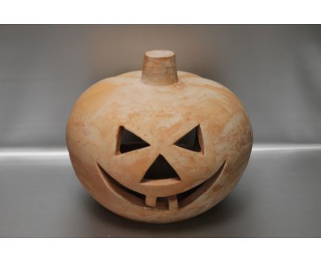A CERAMIC PUMPKIN FOR HALLOWEEN