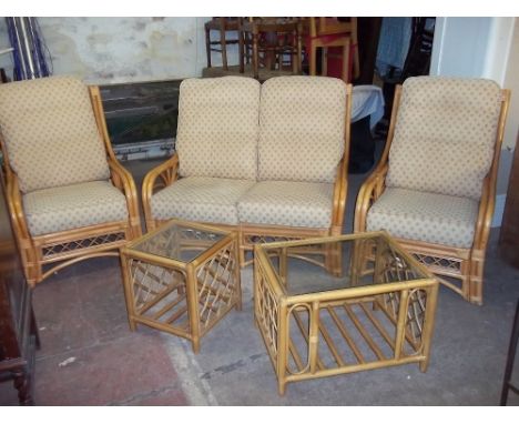 A FIVE PIECE CONSERVATORY SUITE TO INCLUDE A TWO SEATER SOFA, TWO CHAIRS AND TWO TABLES (5)