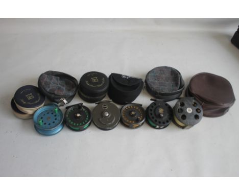 A COLLECTION OF FLY REELS to include "Intrepid," a vintage scout 8-80 etc&nbsp; (6) together with a a quantity of empty reel 