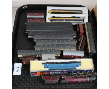 An 'N' scale 4-6-2 loco and tender, an Intercity 125 set (with carriages), a BR diesel/electric loco plus a quantity of rolli