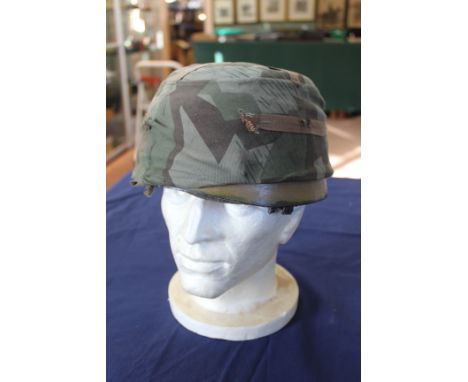 A German (PATTERN) Paratroopers helmet with cover