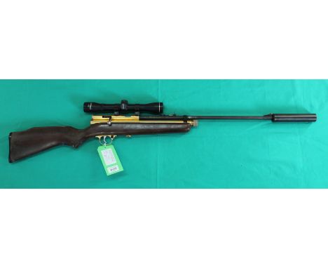 An S.M.K XS78 CO2 .22 CO2 powered air rifle with 4x32 Walther scope and sound moderator, as a post 1939 air weapon the restri