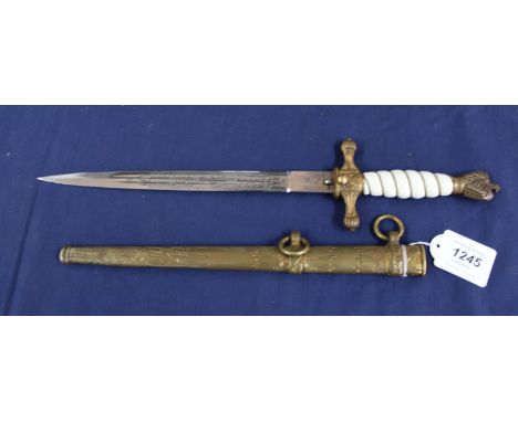 A Third Reich era Naval (Kriegsmarine) Officers dress dagger by Eickhorn Solingen, complete with 'lighting' scabbard, in over