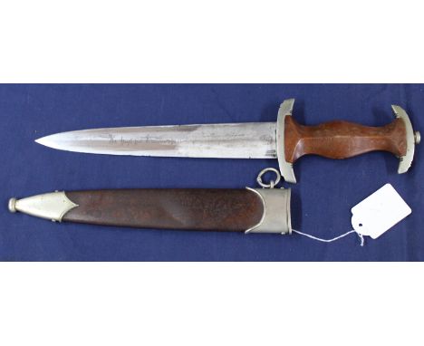 A Third Reich era S.A. dress dagger by Carl Eickhorn Solingen with correct scabbard, crossguard marked 'Nm', blade bearing Er