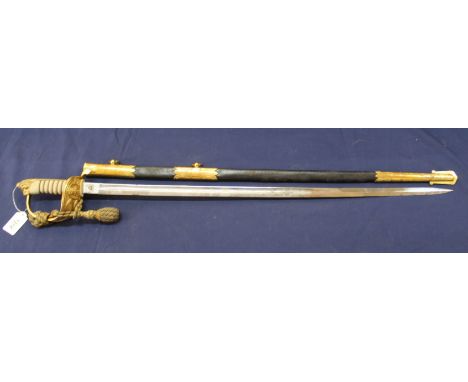 A Naval Officers dress sword complete with scabbard, knot and sword bag, a very good example in excellent condition