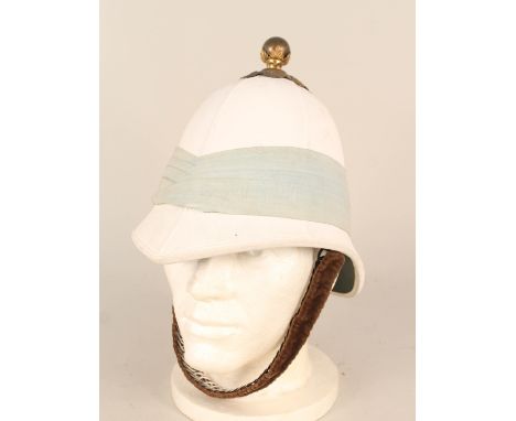 A Colonial service helmet with light blue pagri