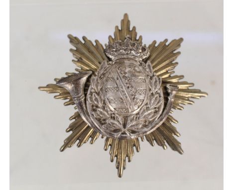 An unusual Saxon enlisted helmet (Shako) plate incorporating a bugle