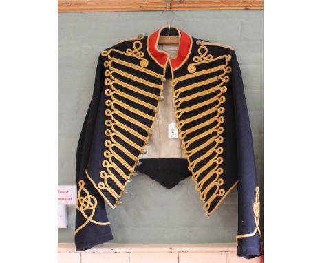 An Artillery frock coat with a Cavalry tunic (both as found)