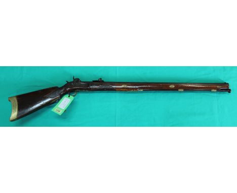 A heavy barrelled hunting/target rifle of approx .50" bore, believed to be of German origin, with brass furniture including a