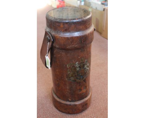 A leather cordite bucket by Burrow, Hepburn &amp; Gale, complete with Coat of Arms and handle, base maker marked and No.56 VI