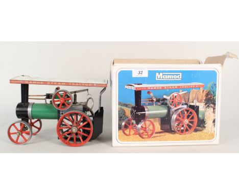 A Mamod steam tractor in original box