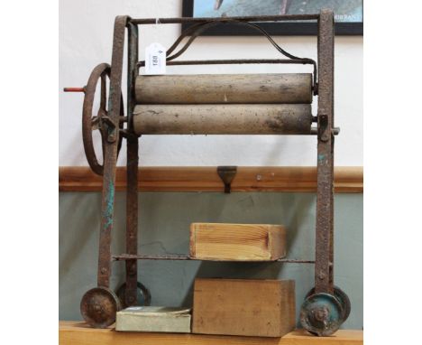 A bygone toy mangle, a boxed Bezique game plus a selection of chess pieces and draughts