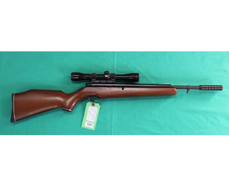 A Webley Tracker .22 sidelever air rifle with scope, in overall good condition, as a post 1939 air weapon the restrictions of
