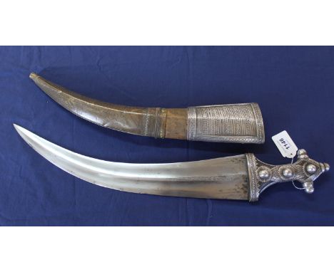 A large Middle Eastern Khanjar (blade 17 1/2") with scabbard, some embellishment missing from scabbard but a very impressive 