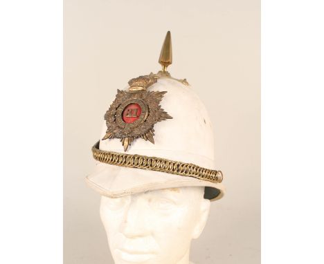 A Victorian colonial service helmet with plate, 31st Reg't of Foot (Huntingdonshire)