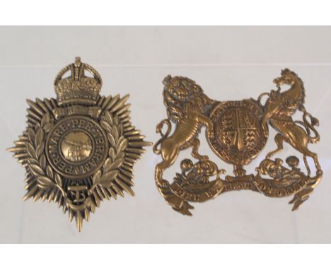 A Royal Marines helmet plate with a Royal Engineers militia helmet plate (as found)
