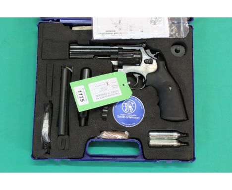 An Umarex 'Smith and Wesson' 586 CO2 .177 cal revolver with 4" barrel, together with this revolver is original fitted case wi