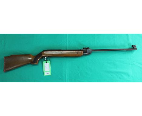 A Diana Mod 35 .22 air rifle in overall fair condition with working action, as a post 1939 air weapon the restrictions of the