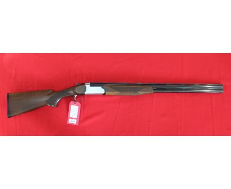 A 12 bore O/U shotgun by Armi Marocchi with 27 1/2" multi chock barrels (only two chokes included), single trigger with safet