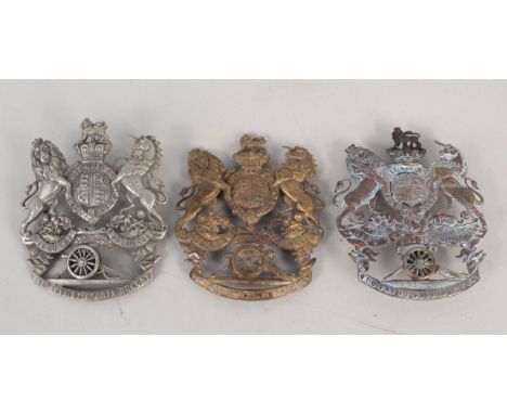Three Royal Artillery helmet plates