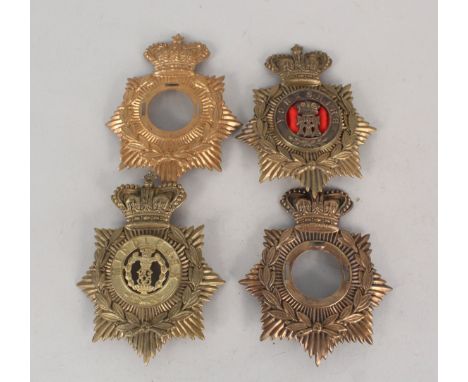 Four replica helmet plates