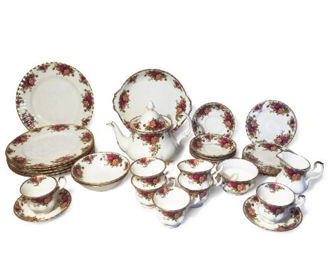 'Old Country Roses' tea and part dining service by Royal Albert. Comprising of Dinner and side plates, cups and saucers, teap