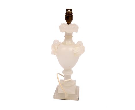 An alabaster carved table lamp. 