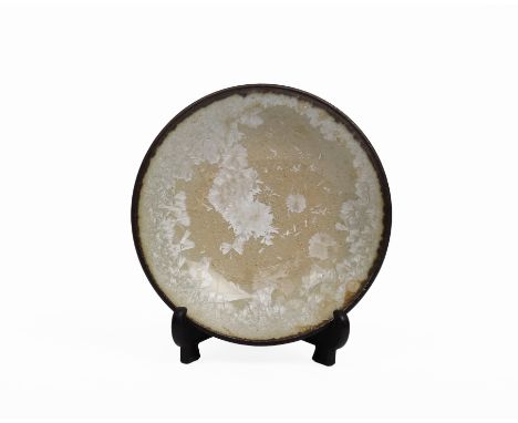 A stoneware footed bowl with manganese/copper glaze with artist seal to base and exhibition markings'17 OF' 113mm(d) 35mm (h)