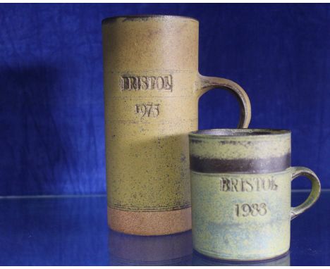 Studio pottery, two ceramic studio pottery mugs by Robin Welch. The taller impressed with Bristol 1975. The smaller impressed