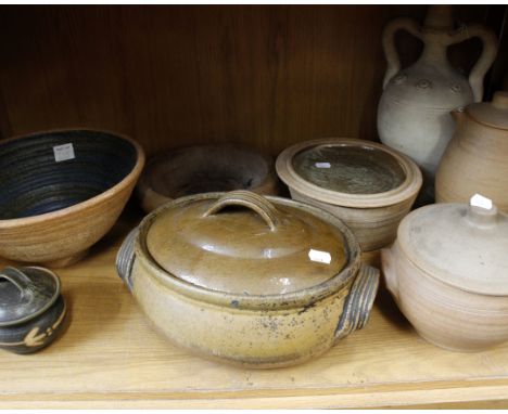 A collection of stoneware items to include a glazed lidded casserole dish, a large bowl with blue glaze interior signed BP. (