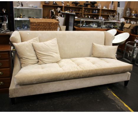 A large cream modern contemporary high back 4 seat sofa. Upholstered in cream chenille fabric, fixed back one long seat cushi