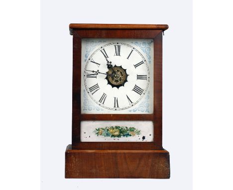 An American walnut &amp; pine cased mantle clock by the Waterbury clock Co, Connecticut 