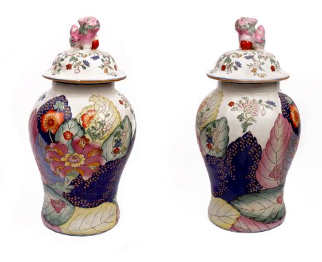 A pair of Oriental  20th century enamel lidded baluster shaped vases. 'Dog of Foe' finials48cm(H)