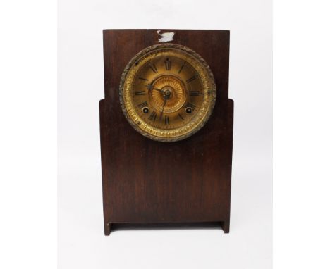An oak cased mantle clock.