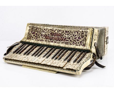 Accordion, a decorative 'Cooperativa L'armonica, Italia Stradella super de luxe, 120 button, good condition apart from a litt