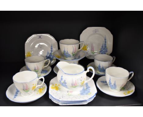 A vintage ABJ Grafton china tea set, to comprise teacups, saucers, sandwich plate, and milk jug