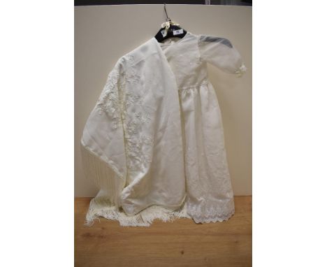 A vintage christening gown with shawl