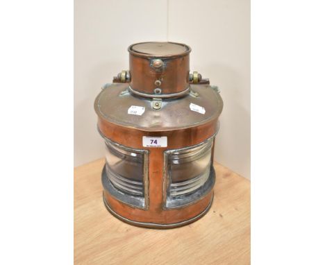 A vintage copper and glass ships lantern, back plate has impressed marks; GP LD 1943, and a date of 1936 to front of lantern 