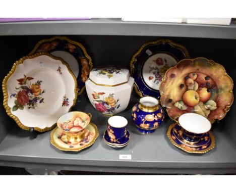 A selection of Caverswall bone china, including hand painted Royal Worcester style plate, cup and saucer, lidded jar with flo