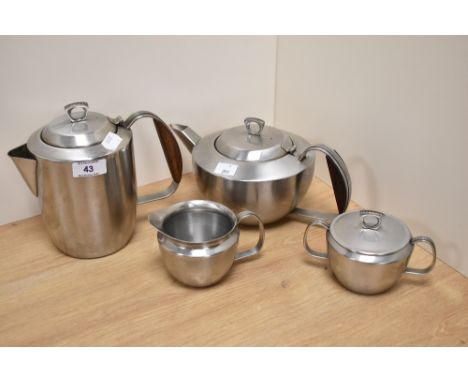 An assorted collection of Cavalier stainless steel tableware, comprising coffee pot, tea pot, milk jug, and sucrier