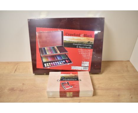 A Crawford and Black complete colouring and sketch studio and an artists sketch set, both in original packaging.