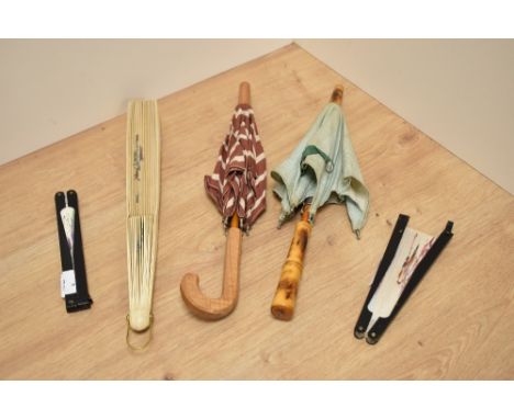 Three vintage silk hand fans, of Chinese interest, and two parasols