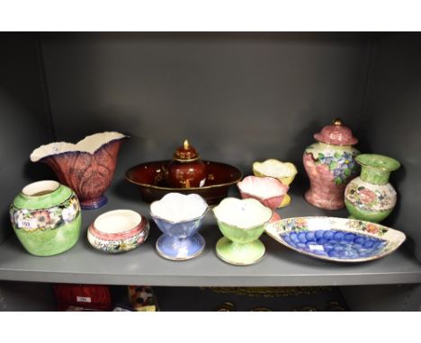 A collection of vintage Maling ware and Carlton ware, including Rouge Royale ginger jar and bowl, lustre finish sundae dishes