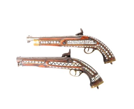 Two percussion pistols, with Eastern mother-of pearl decoration and brass mounts,40cm and 34cm, the smaller marked Enfield 18