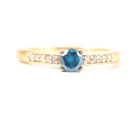 Gemporia - a blue and white diamond ring, a round brilliant cut 4.6mm blue diamond, claw set in a 9 carat yellow gold mount w