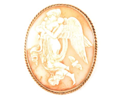 A shell cameo brooch, the oval carved shell cameo of an angel holding two children with a cherub in the distance 48x39mm, set