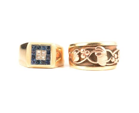 Two dress rings, one a 9 carat yellow gold band graduating from 8mm to 12mm wide, the front inset with red gold leaf detail, 