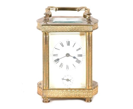 French brass cased alarm carriage clock, timepiece movement, serpentine case with fine filigree outlines, Roman numeral chapt